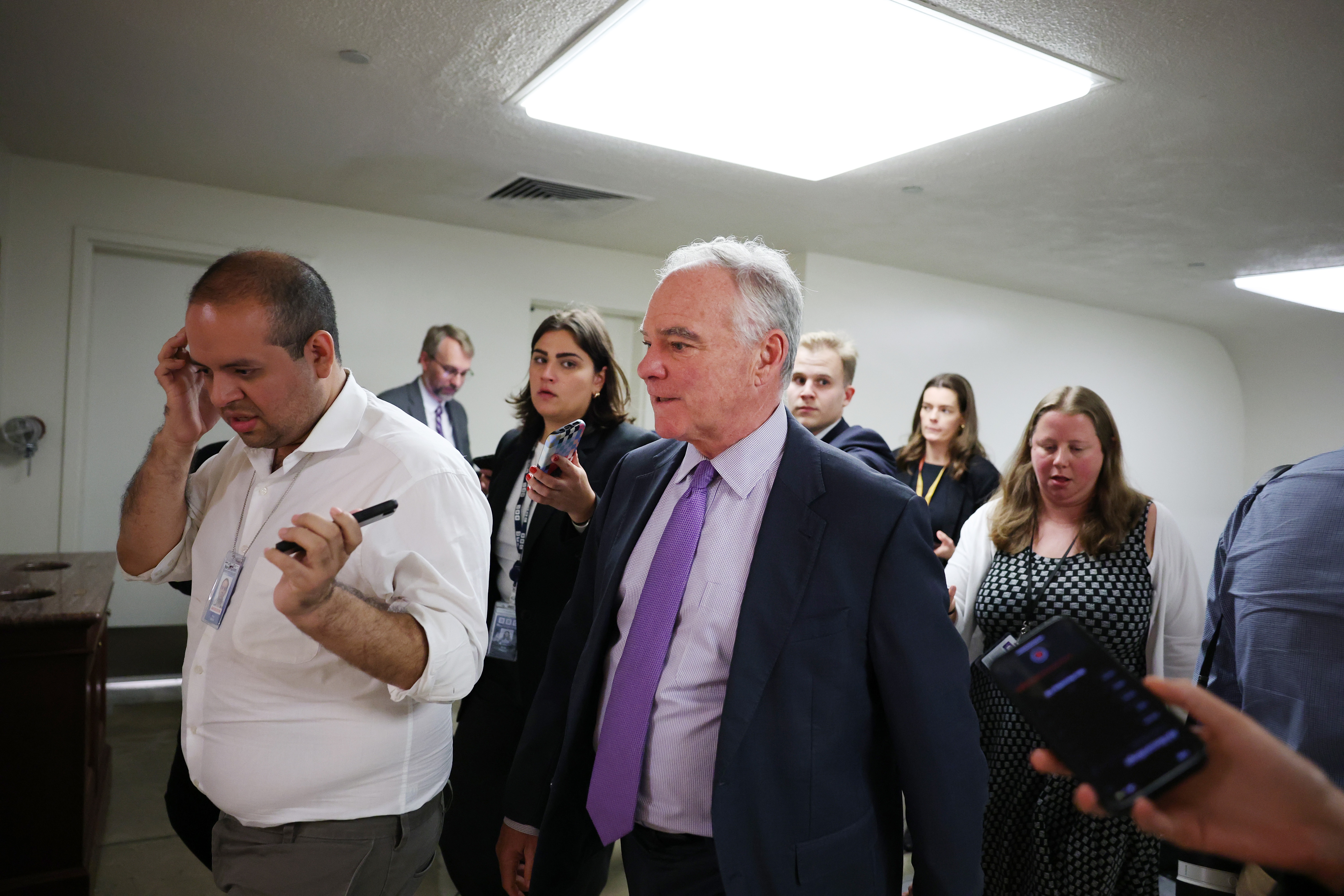 Sen. Tim Kaine, D-Va., speaks to reporters in the U.S. Capitol Building on Sept. 30.